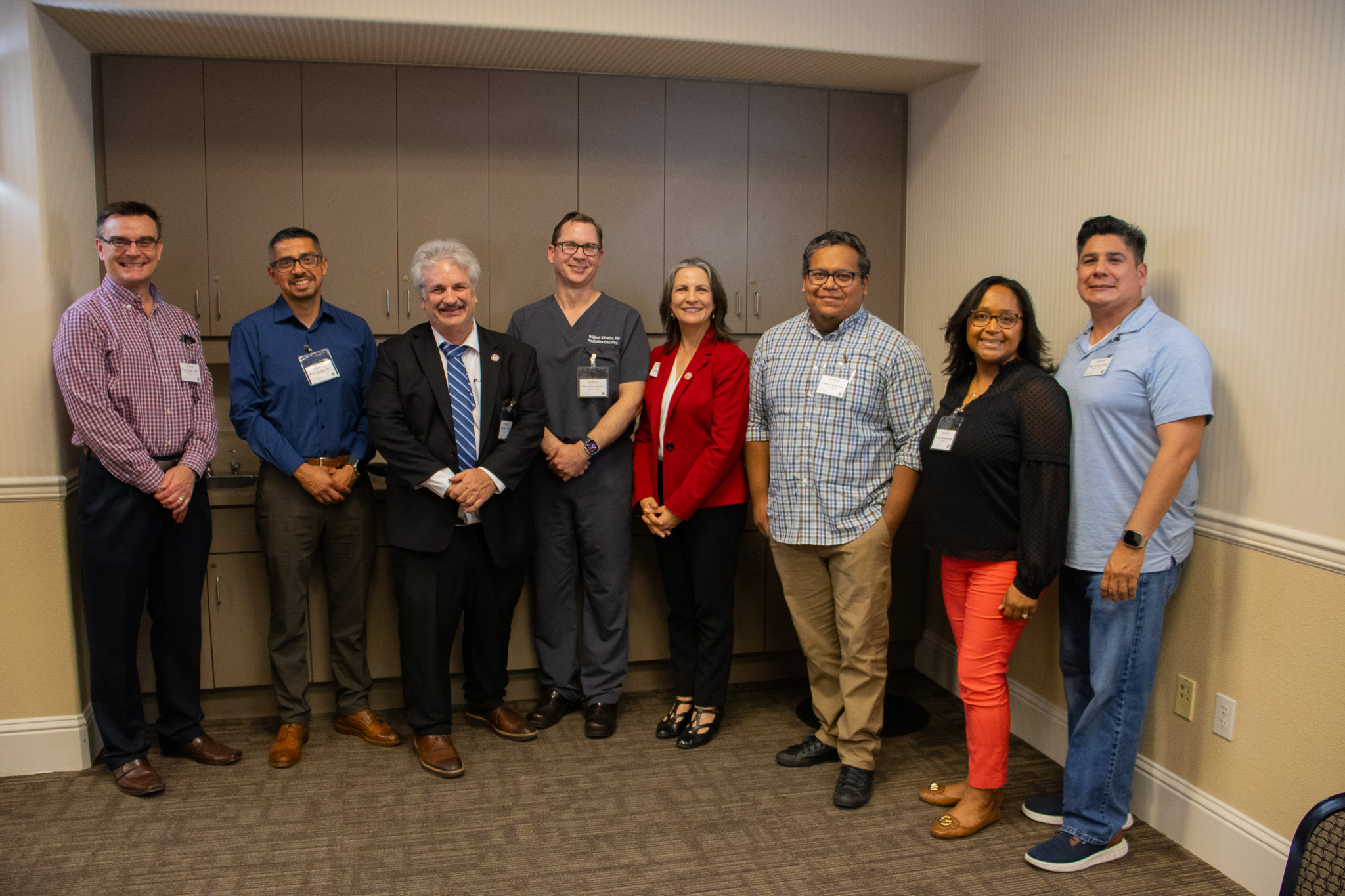 Our director, Lilia de la Cerda, standing with the Deans of the College of Science and Math, along with former HCOP alum and current doctors.