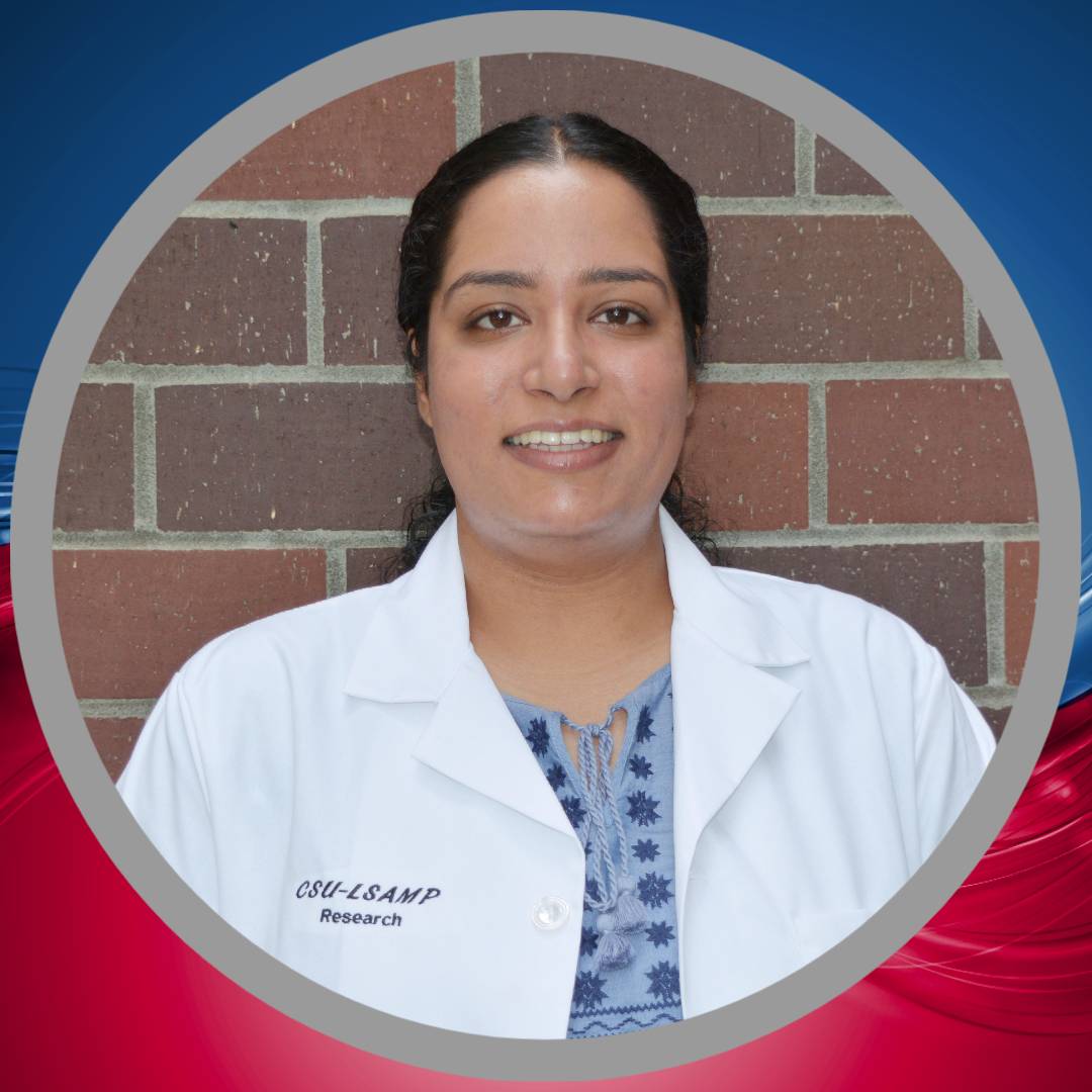 Ravinder Kang wearing a lab coat