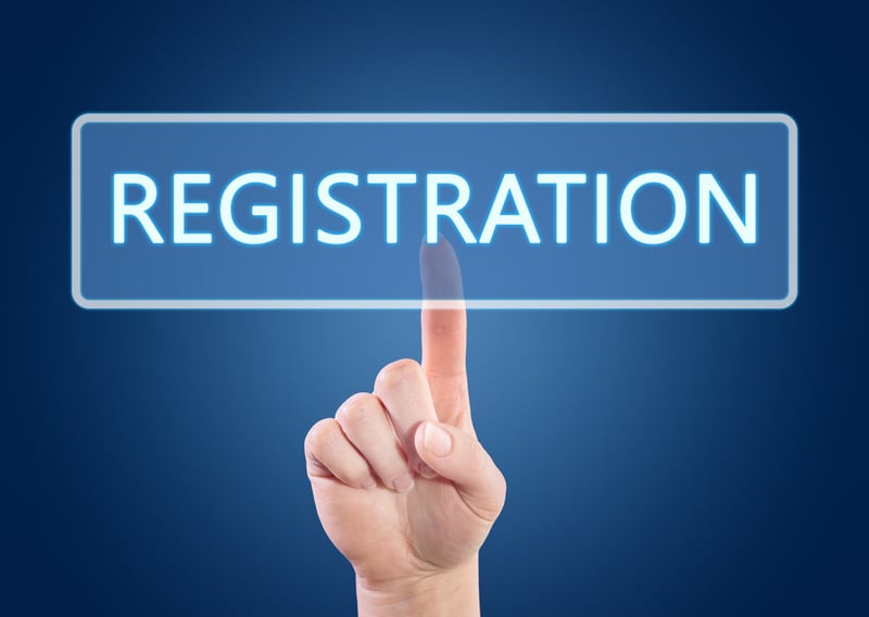 finger pressing a floating registration button