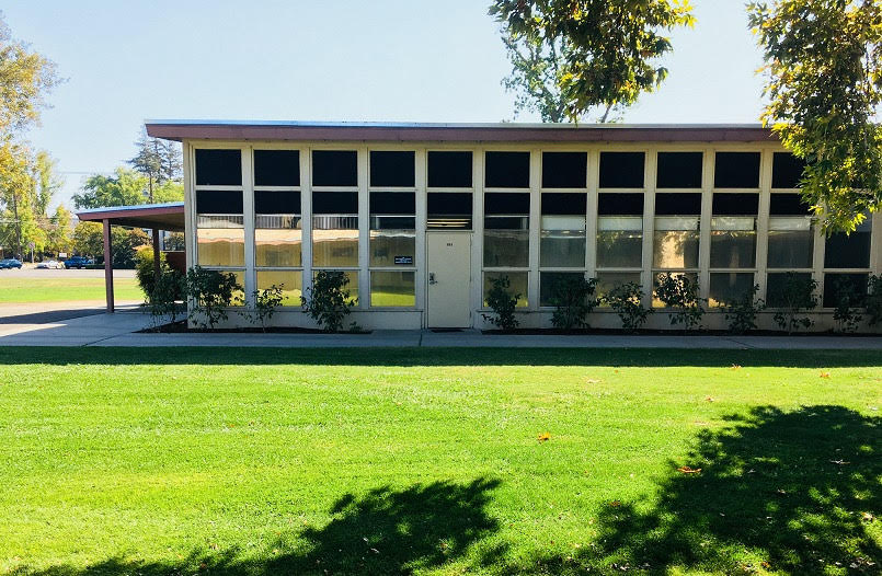 ABA@FS Main Office The ABA@FS main office, a large building showing one door and many windows across a field of green grass.